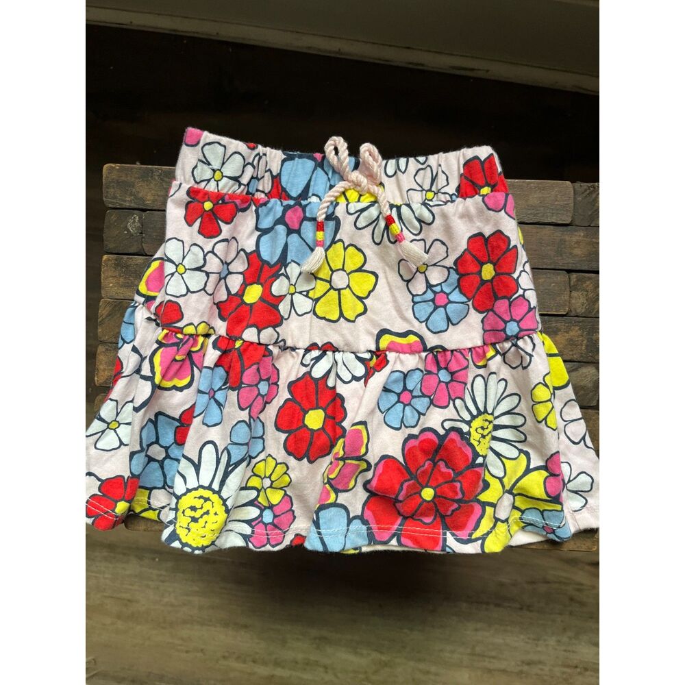 Girls Floral Skort, lightly ribbed material, bow accent with elastic waist.